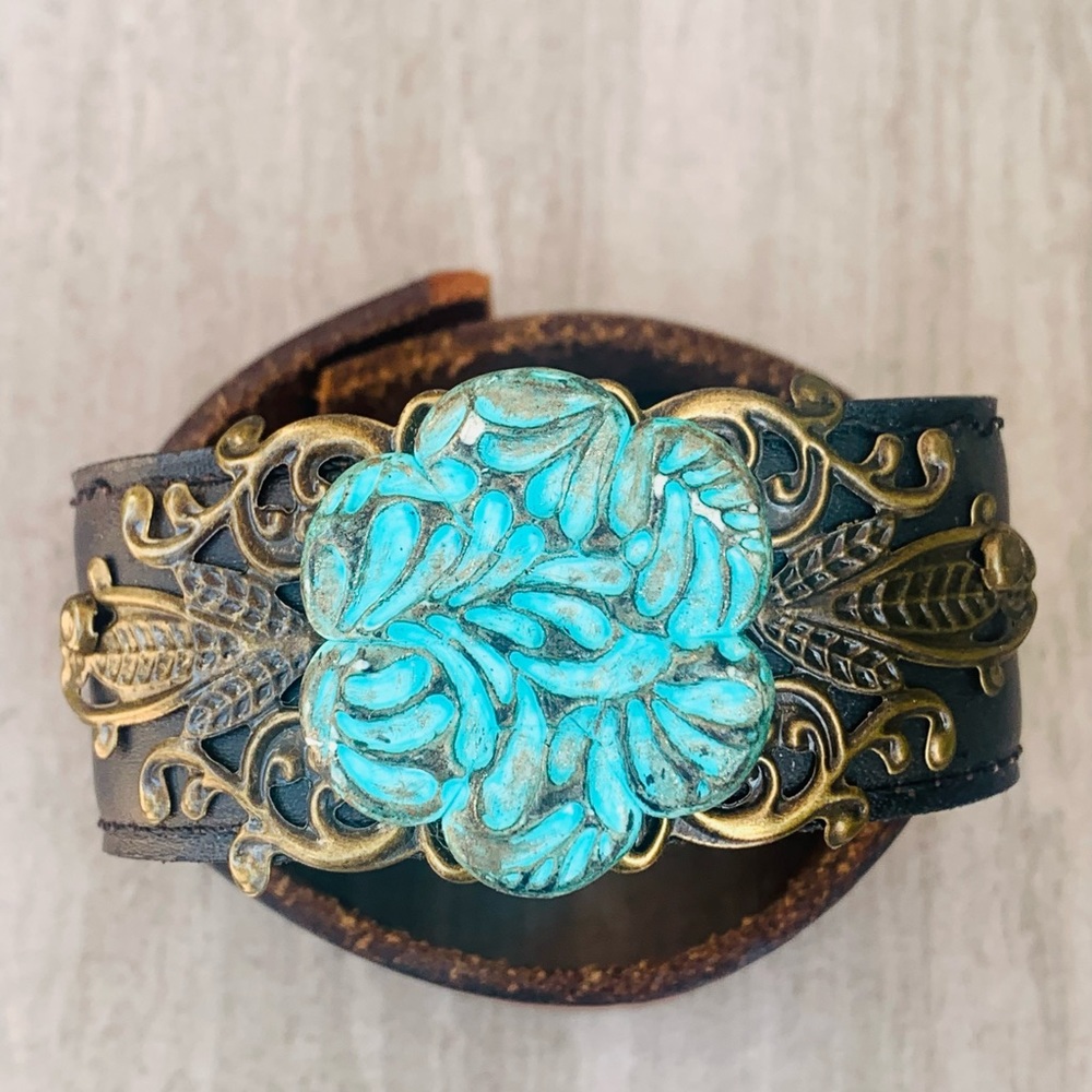 Upcycled belt cuff with polymer clay flower